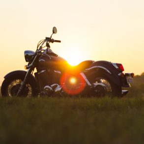 Cruiser motorcycle against sunset